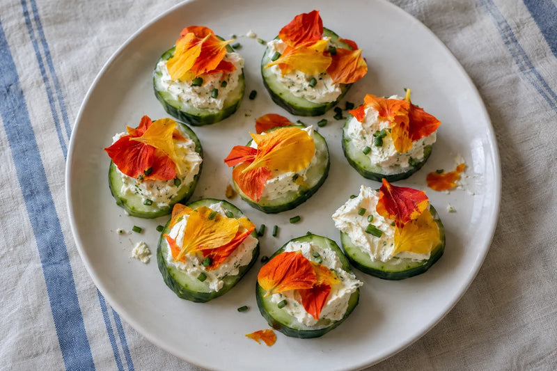 AI-generated serving illustration: Nasturtium Cream Cheese Cucumber Bites