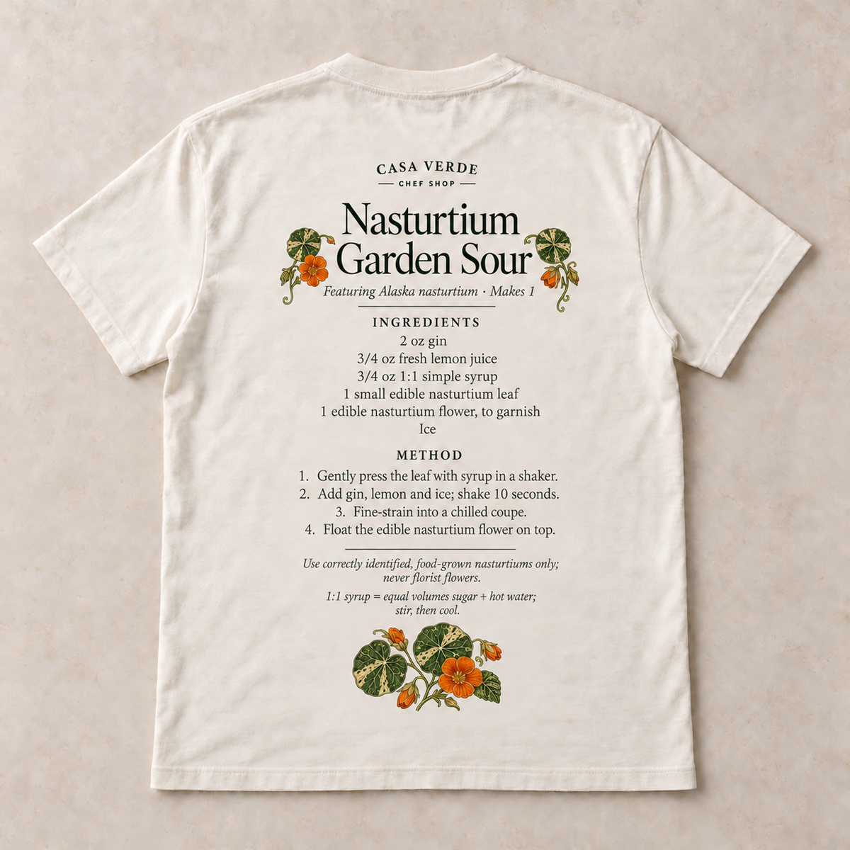 Nasturtium Garden Sour T-Shirt — approved individual back design preview with cocktail-recipe lettering and matching botanical illustration and the Casa Verde Chef Shop signature. Illustrative garment mockup, not a production master.
