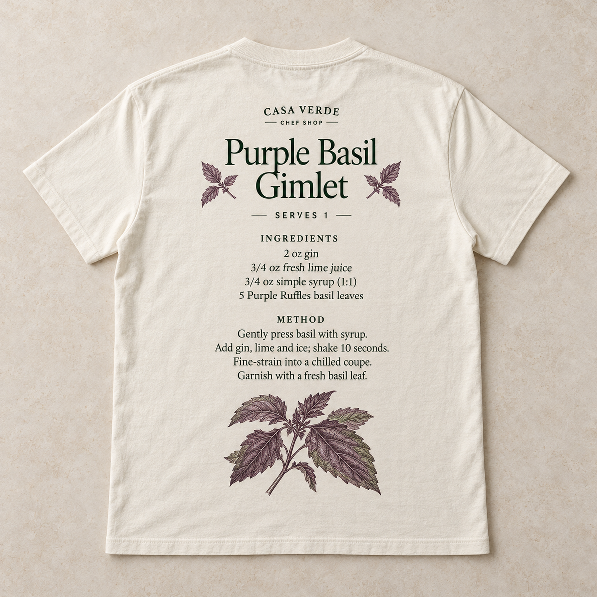 Purple Basil Gimlet T-Shirt — approved back preview with dark green cocktail recipe lettering and a basil drawing. Garment mockup, not a production master.