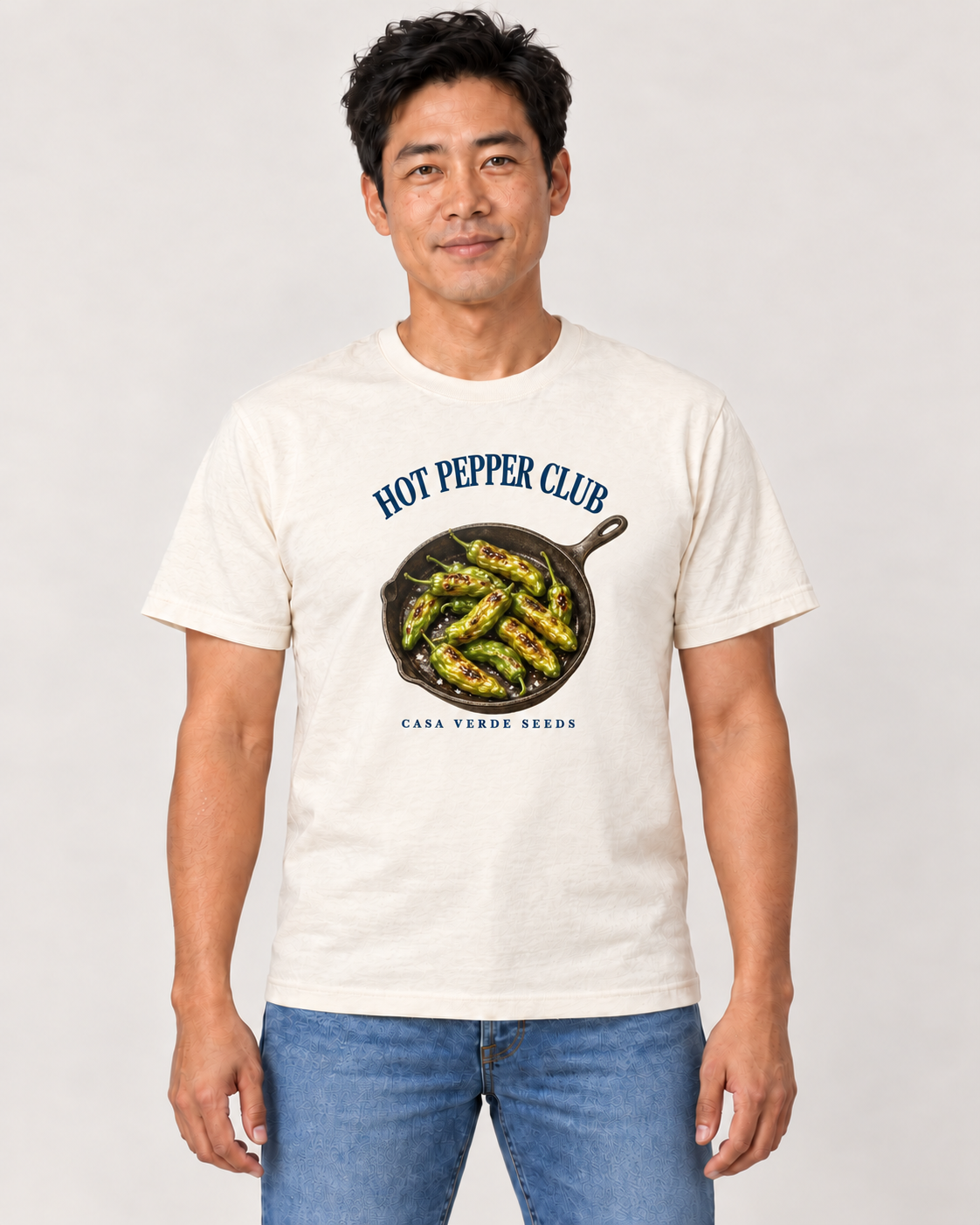 Hot Pepper Club T-Shirt — AI-generated front model showing the approved painted shishito skillet design. Illustrative preview, not a physical sample or production proof.