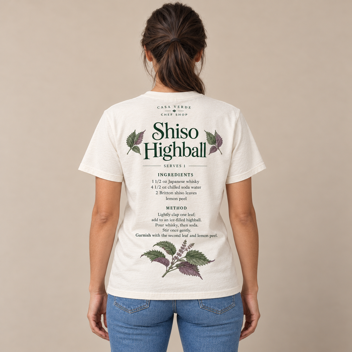 Shiso Highball T-Shirt — AI-generated back view showing the cocktail recipe, botanical illustration and Casa Verde Chef Shop signature. Illustrative garment preview, not a physical sample or production proof.
