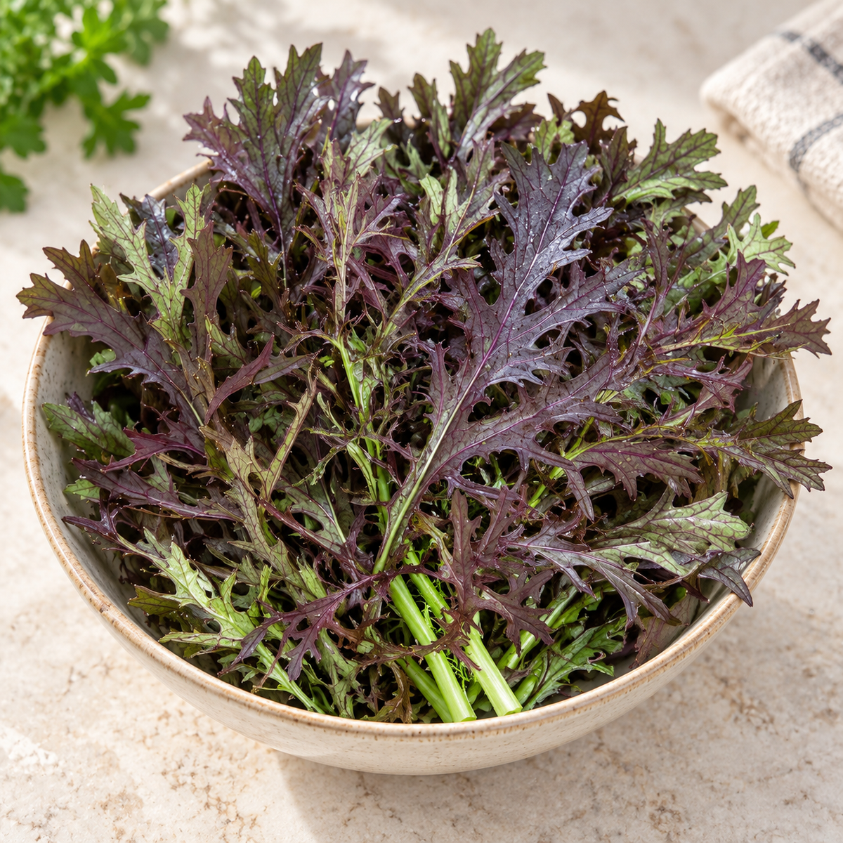 Ruby Streaks mustard greens in a ceramic bowl