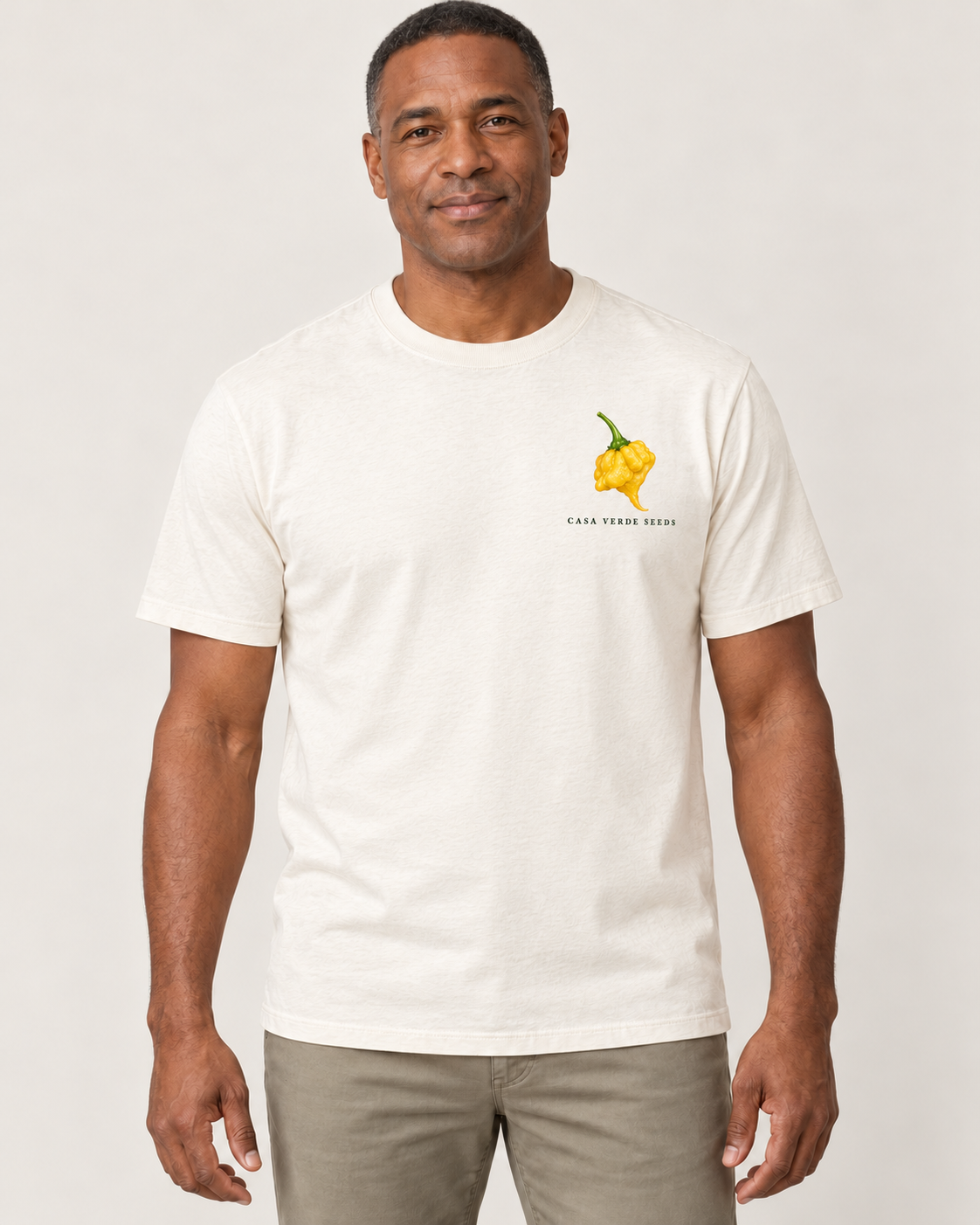 Peppers Botanical T-Shirt — Front shown on a model. Illustrative garment preview; final fit and print placement may vary.